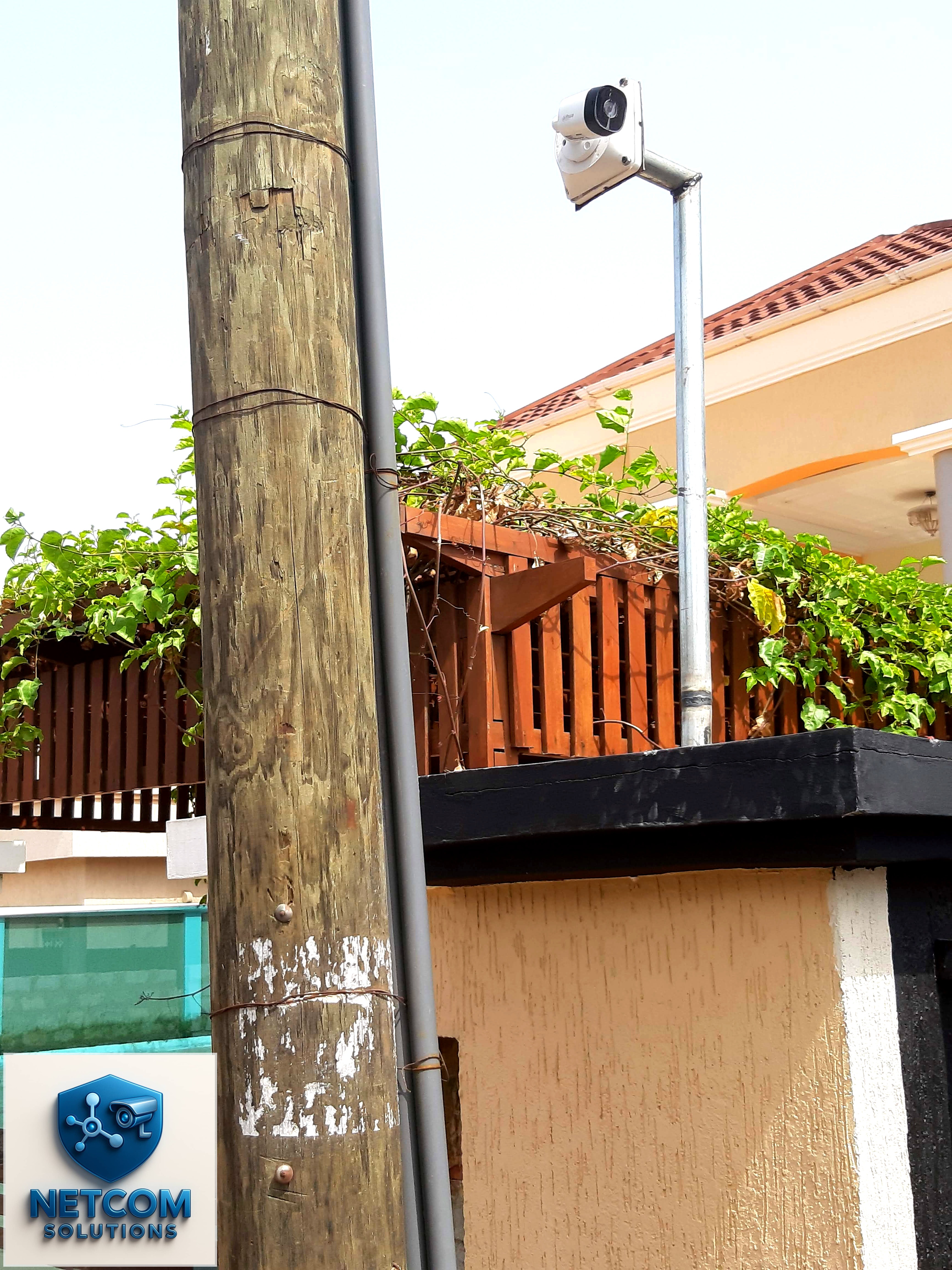 Outdoor bullet camera mounted for perimeter surveillance