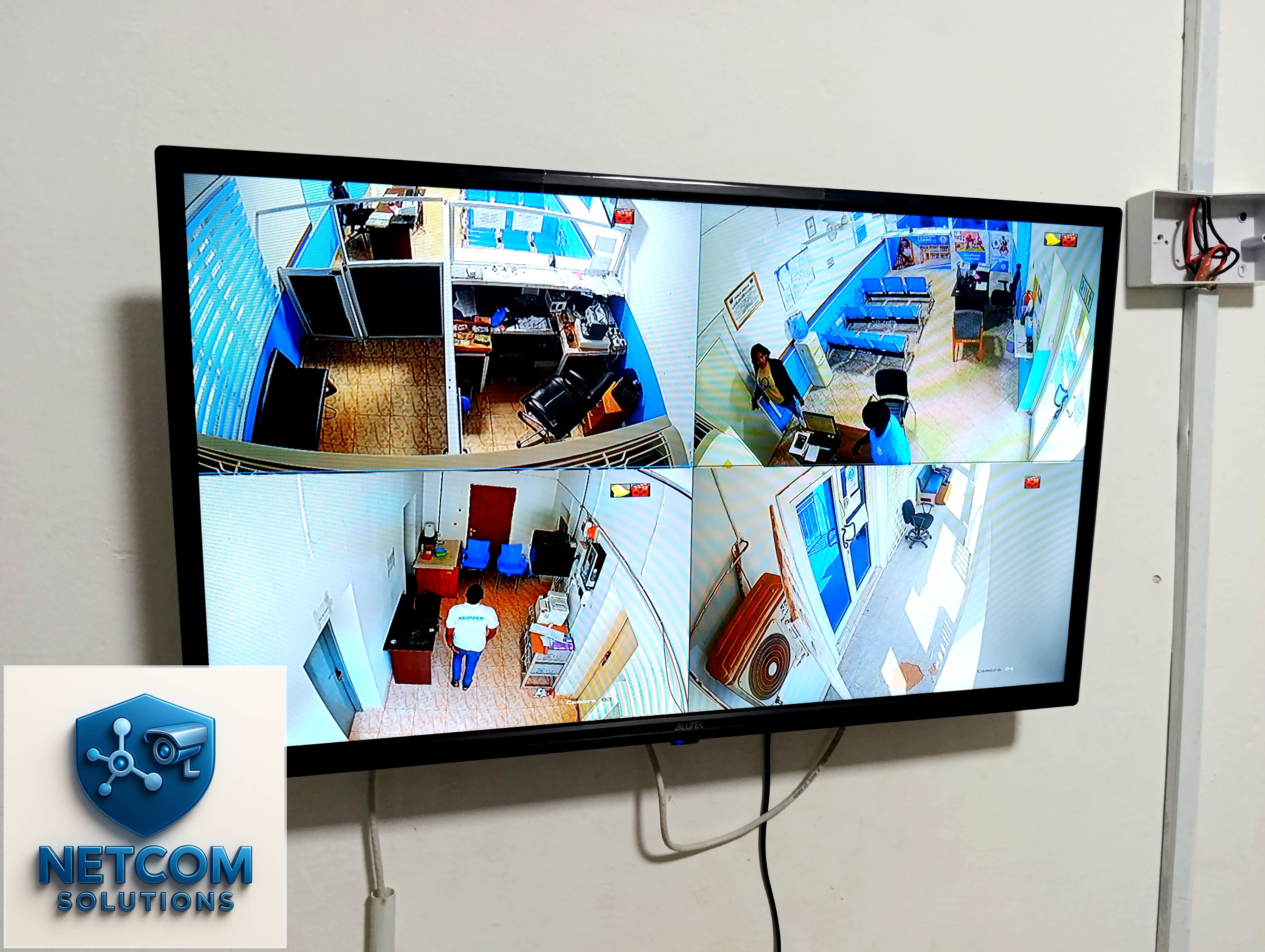 Four-channel CCTV live view of office premises